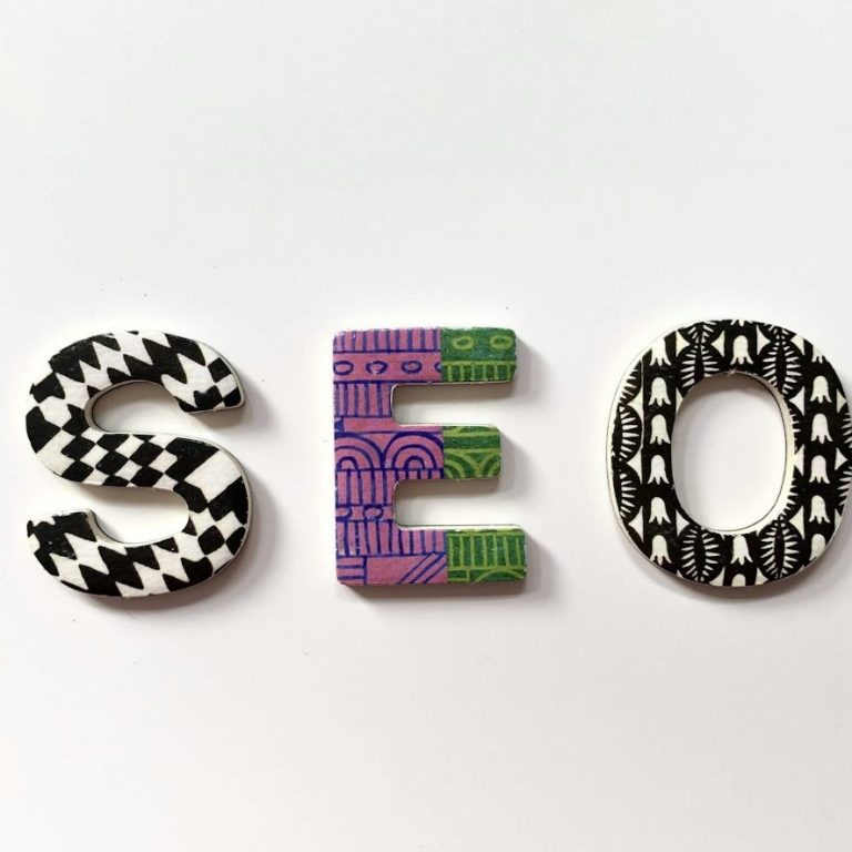 Colorful, patterned letters spelling "SEO" on a white background.
